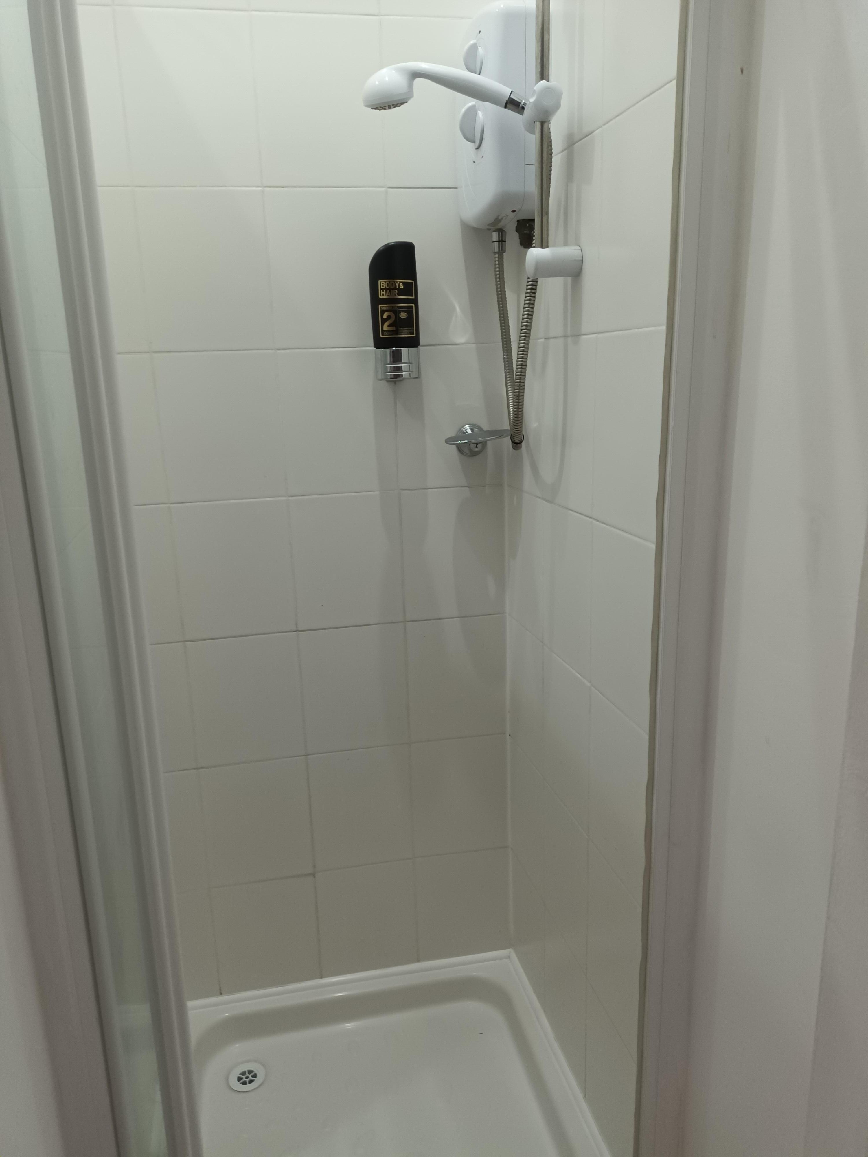 Tiny shower. 