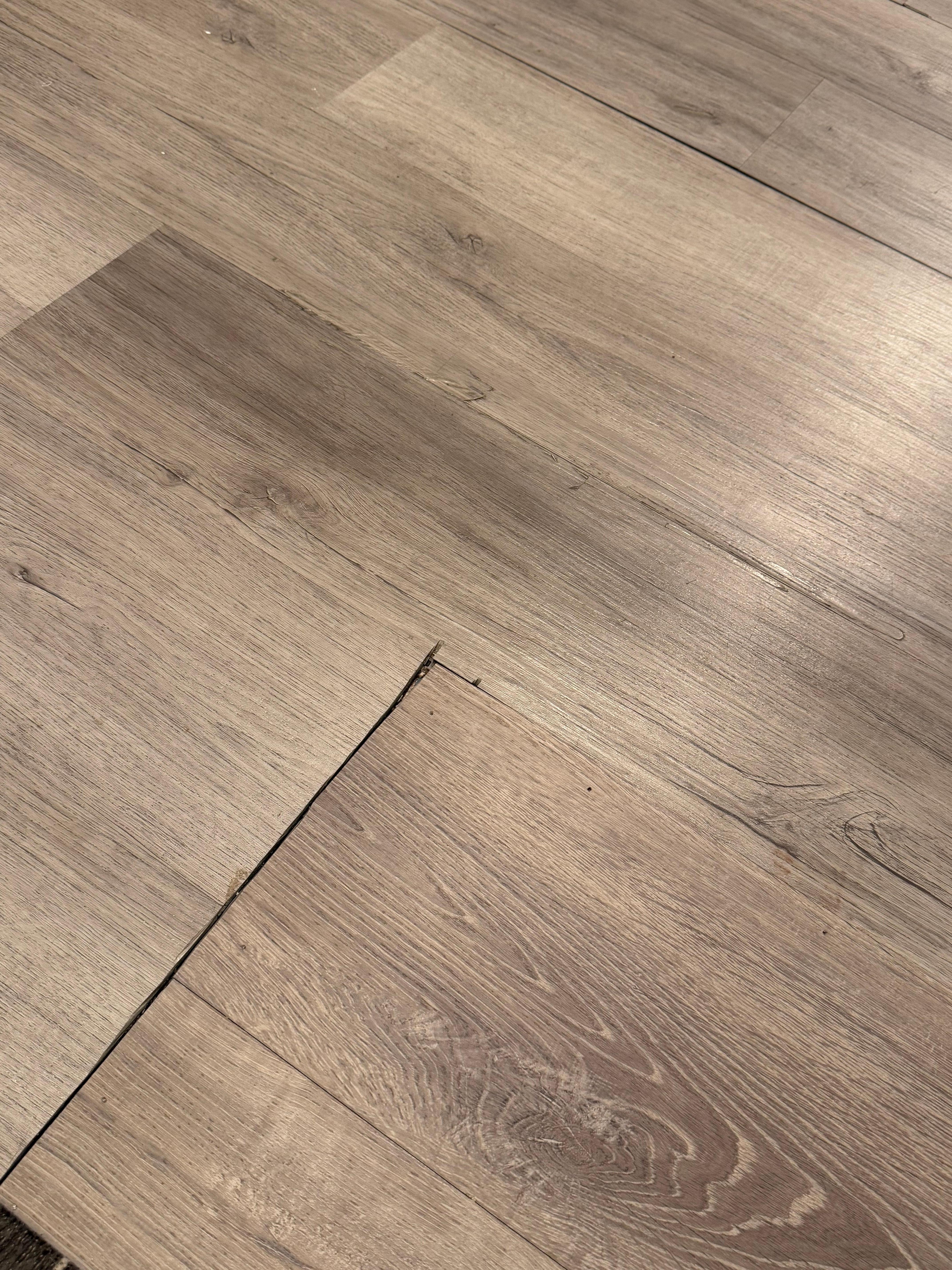 Floor was cracked and would wobble under foot on every step in bathroom