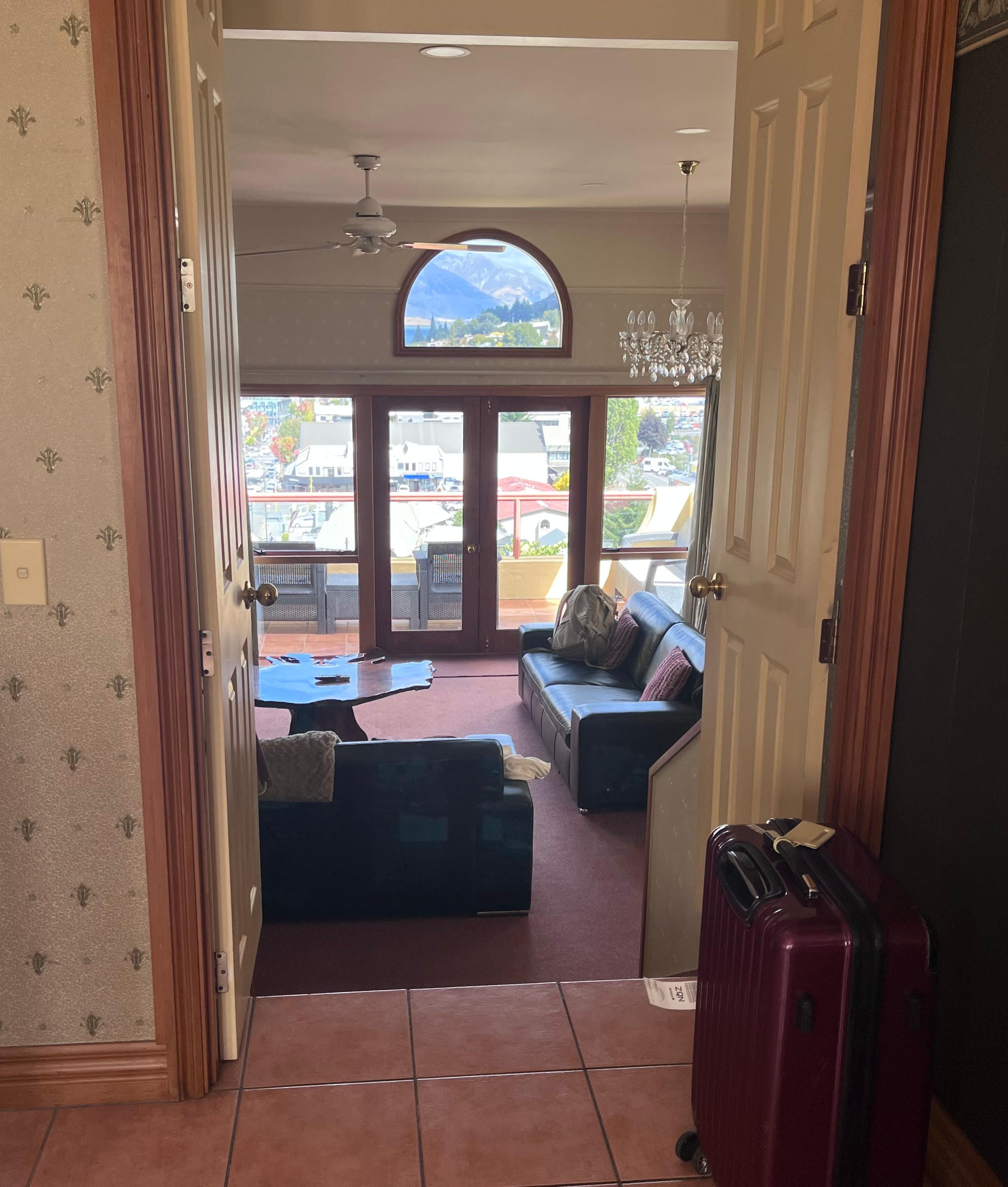 View from the entry, lake is framed in the half circle window. 