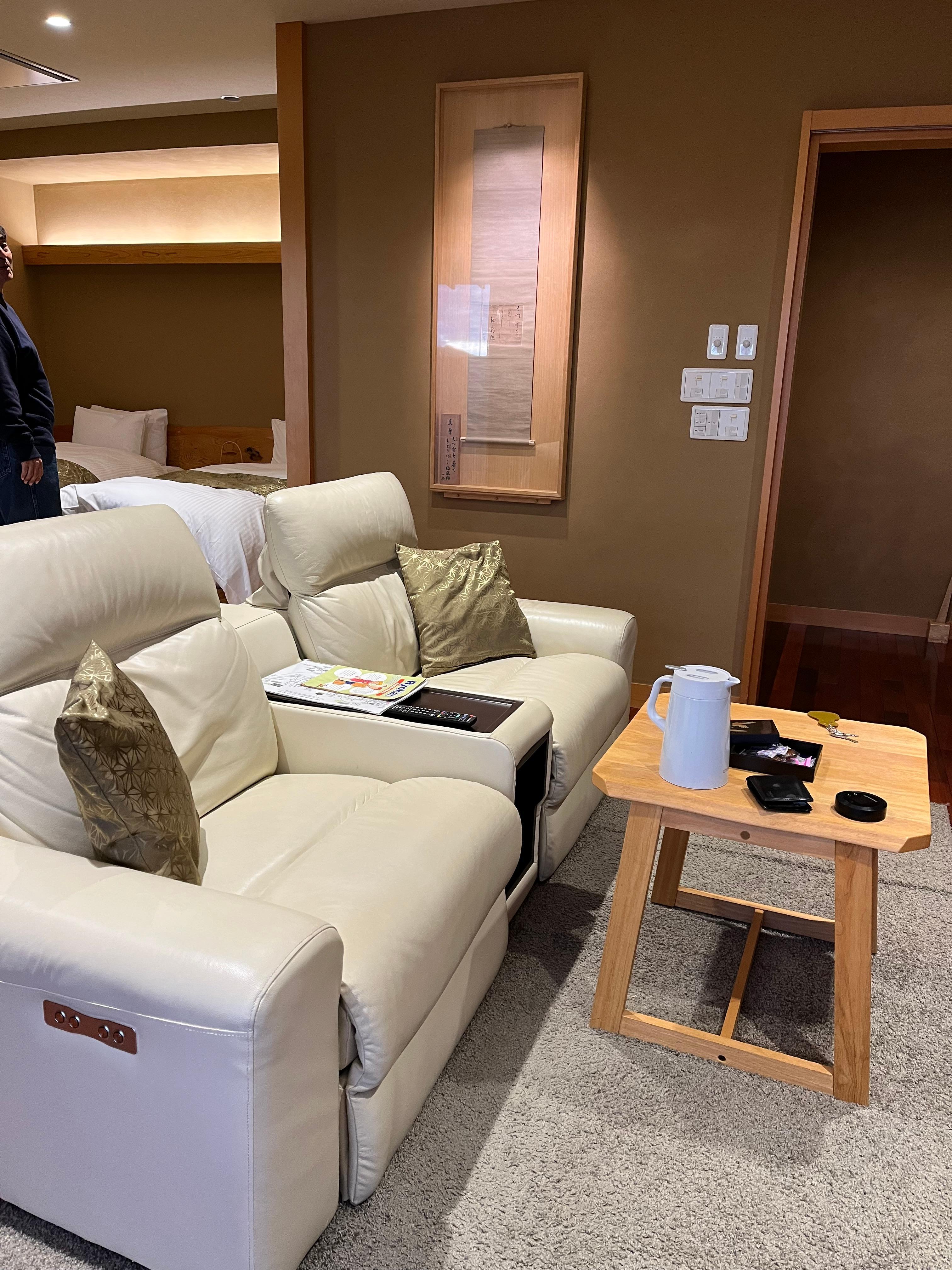 Room with private onsen on balcony.