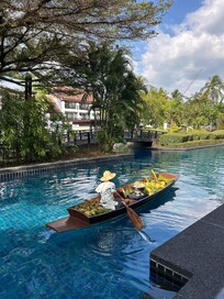 For drinks on your terrace you can flag down the coconut boat or swim to one of the bars