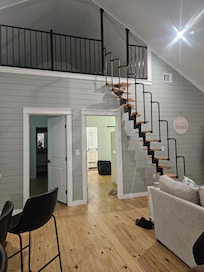 Adorable loft area and stairs.