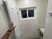 The bathroom door swings into the sink area, which can be tight. But not an issue.