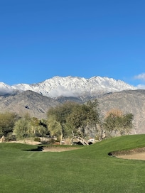 Snowy peaks but beautiful blue skies and sunshine