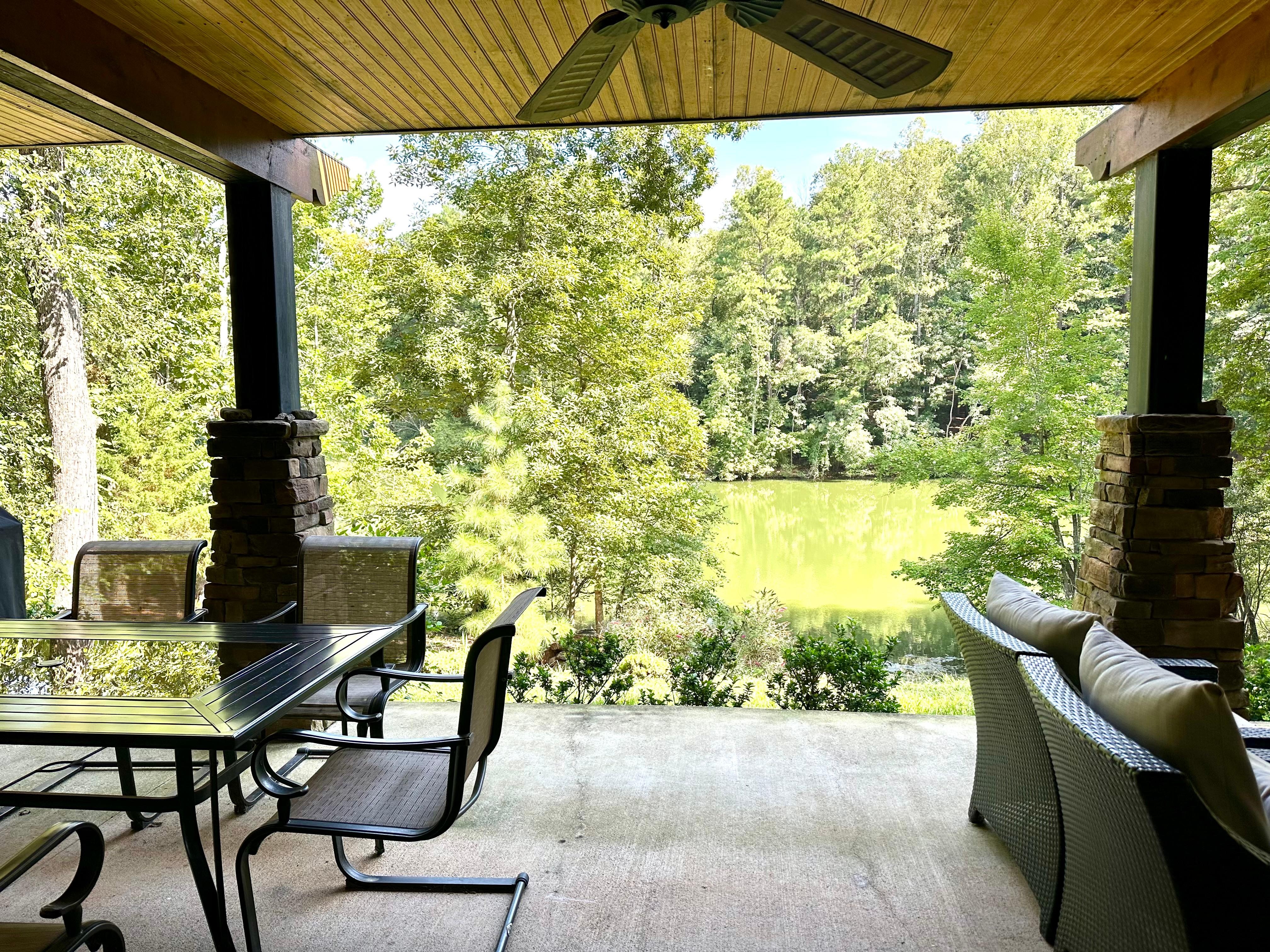 Large outdoor space with grill and comfy outdoor furniture