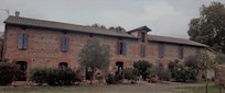 la façade de la ferme ô délices...
