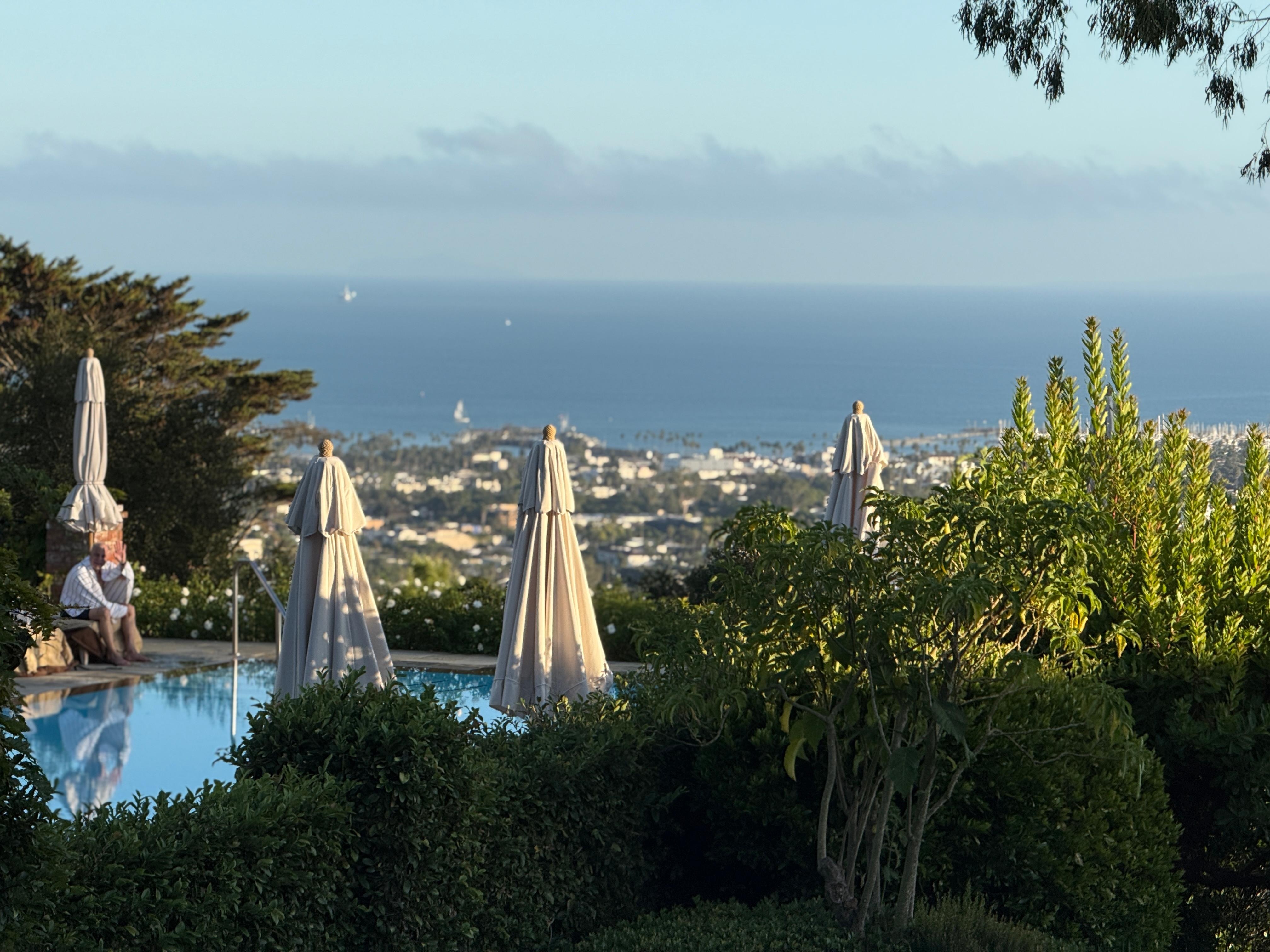 View from our front porch of the lovely pool and Santa Barbara and the Pacific beyond.