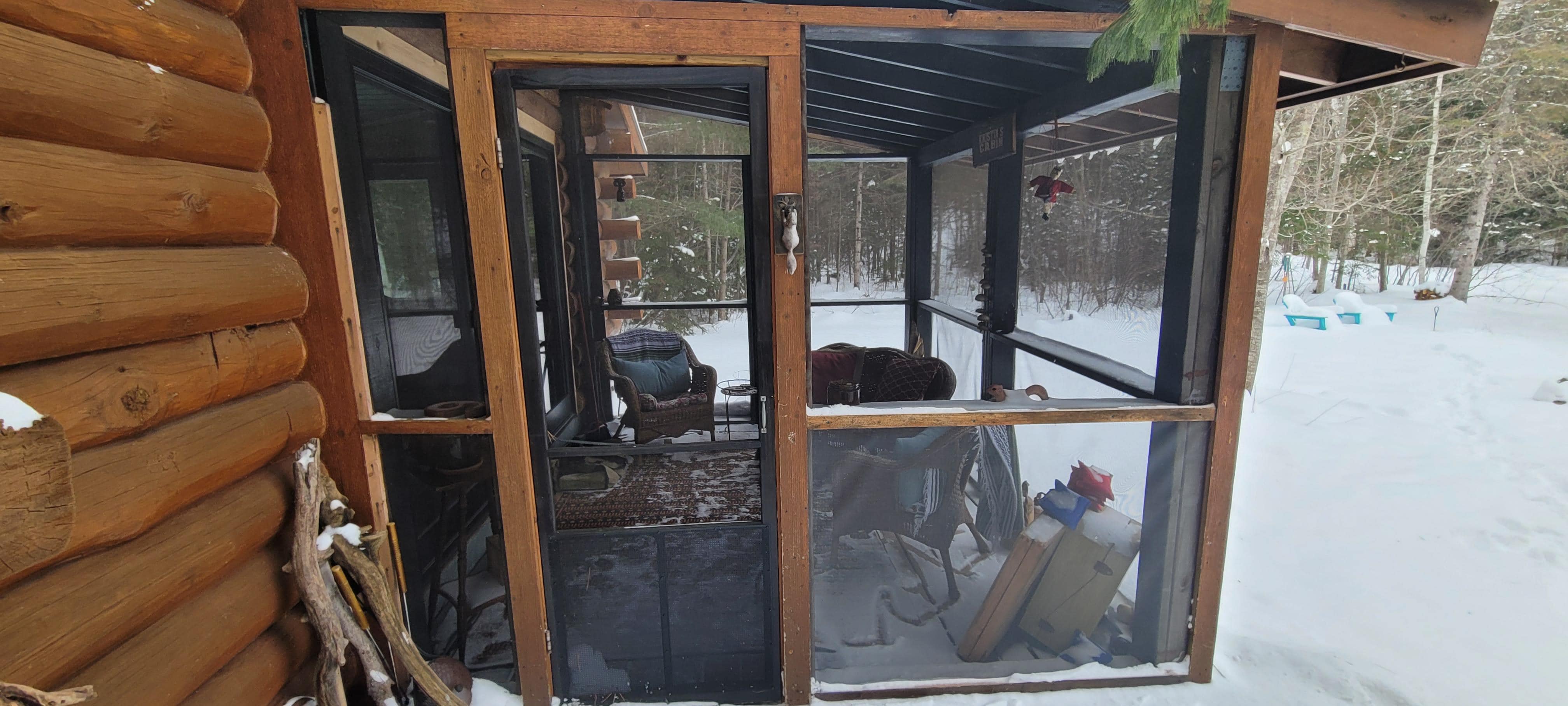 Beautiful porch with yard games for the summer