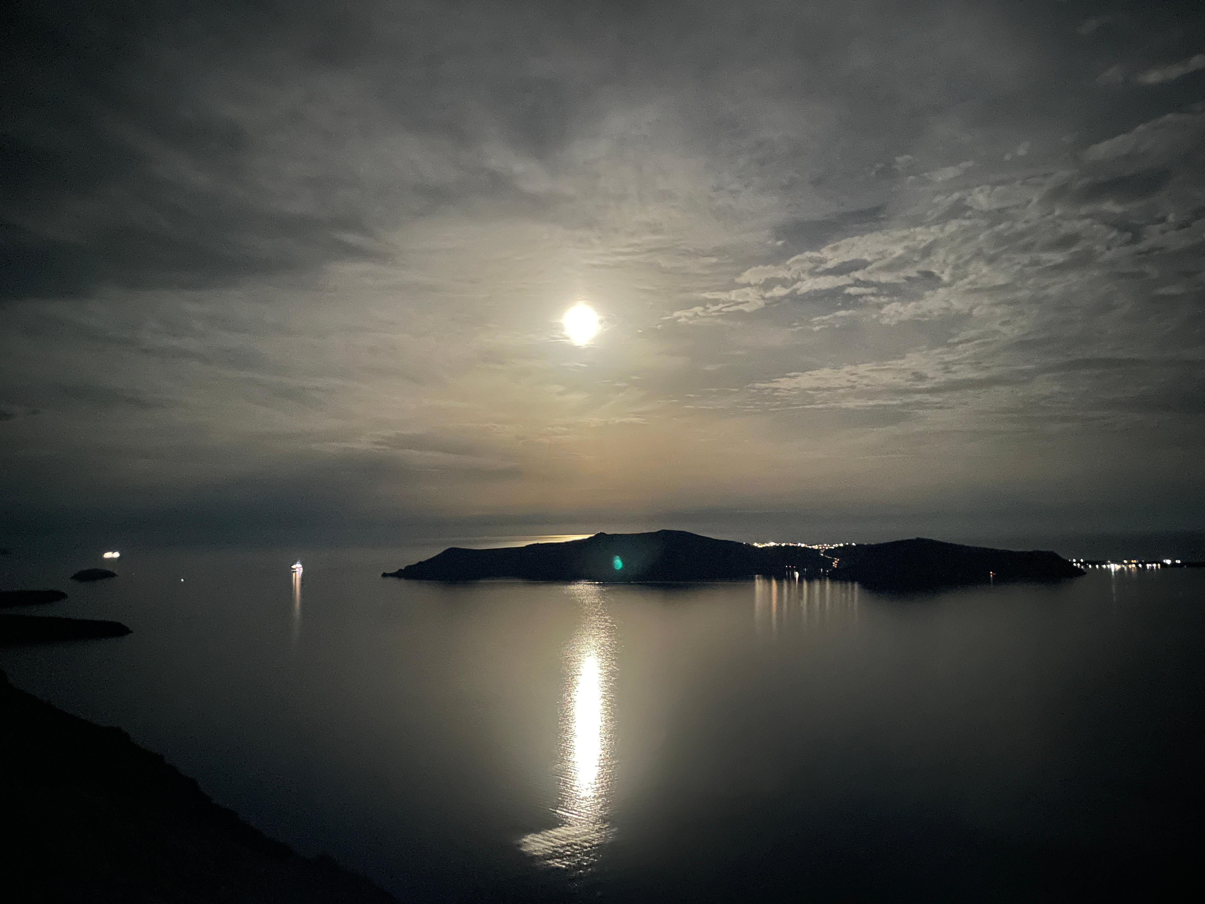 The full moon over the caldera. Photo taken from our balcony.