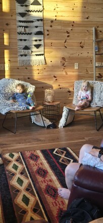 Every morning we were there, 2 of my grands had to chill in this very spot in the house.
