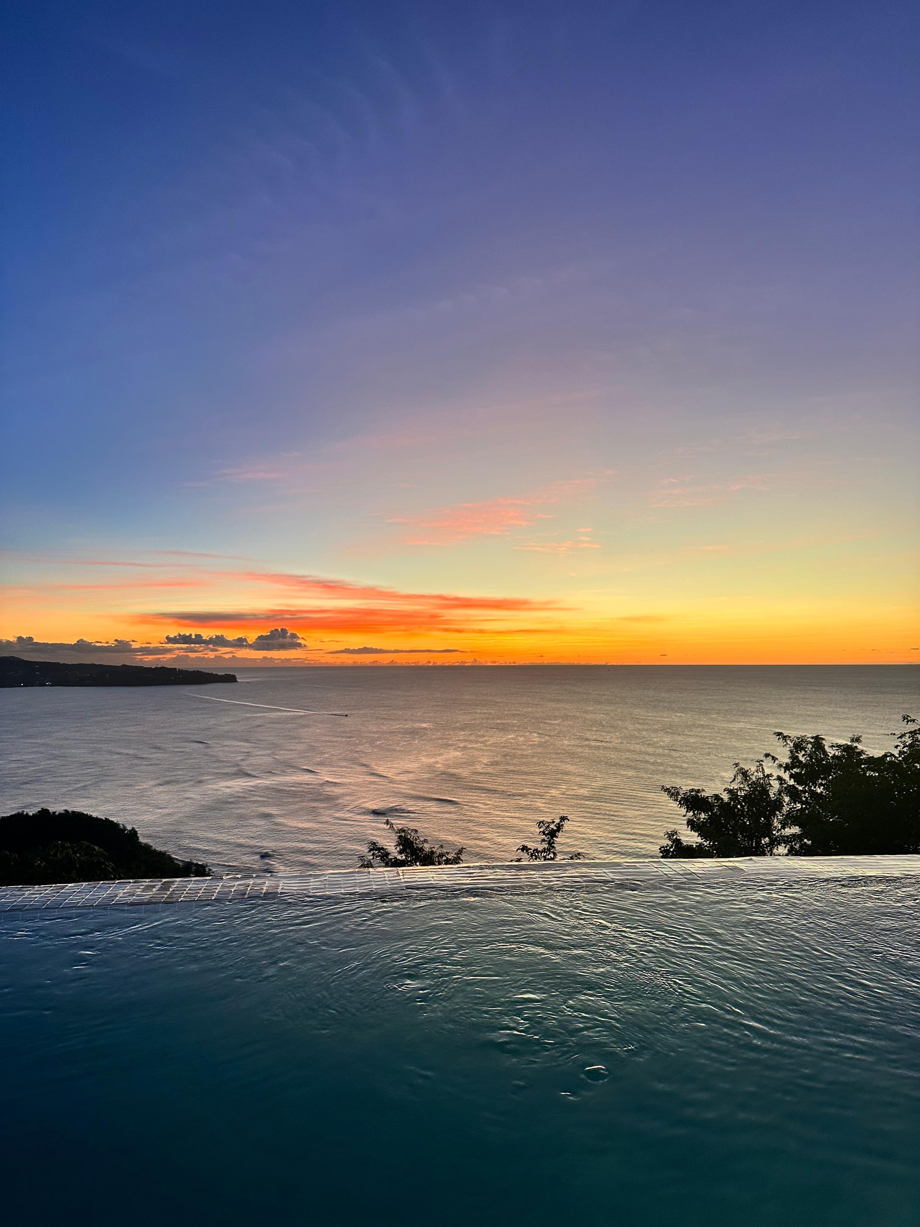 Sunset at the villa with our pool. 