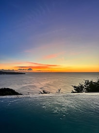 Sunset at the villa with our pool.