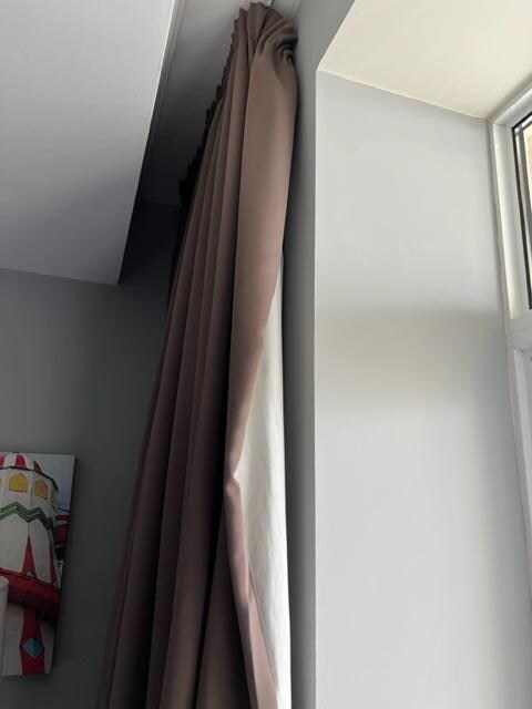 curtain hanging off