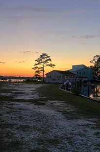 House at sunset from pier