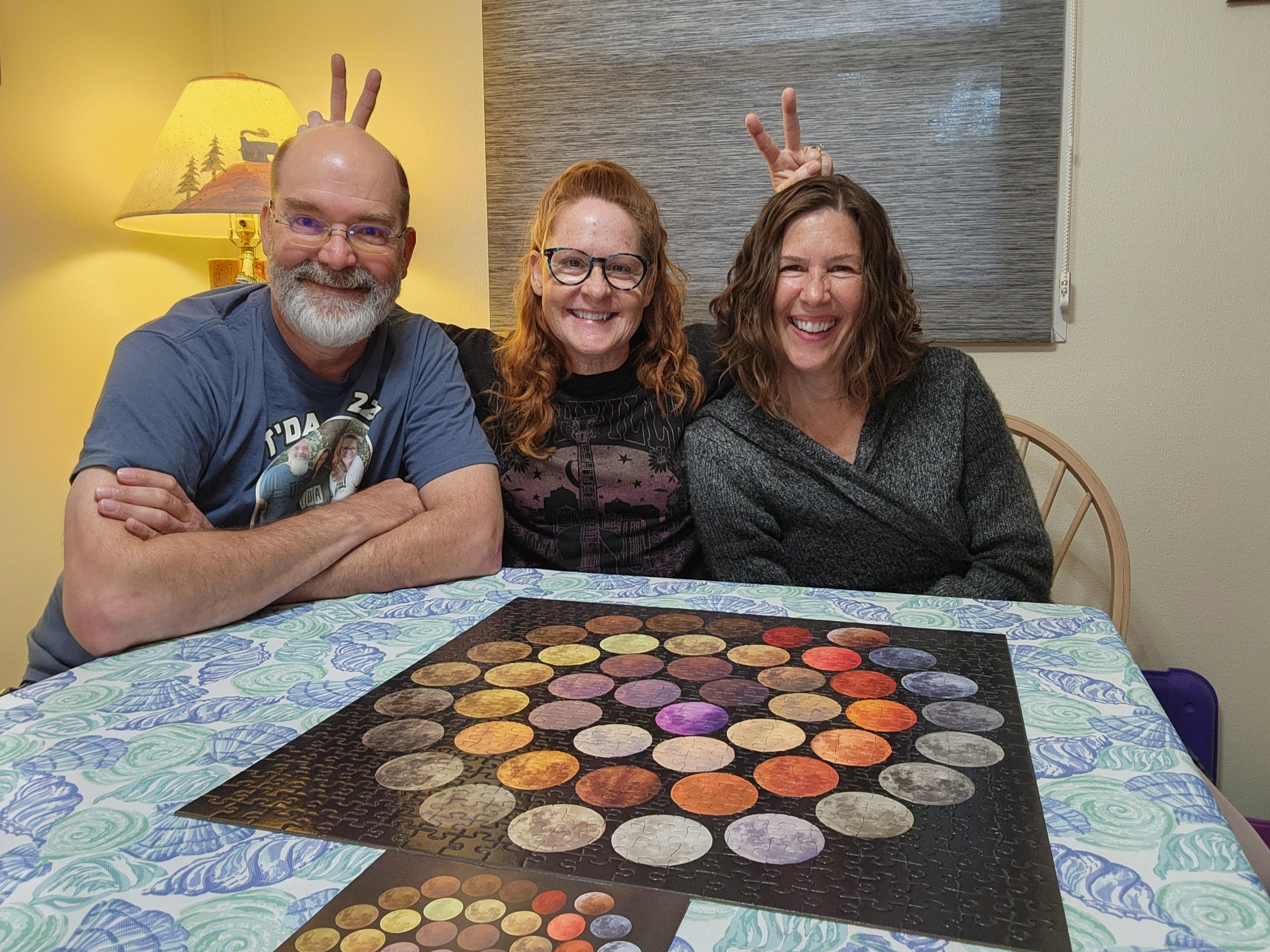 Brother, sister and myself after completing a puzzle