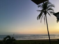 Watching sunsets from our balcony
