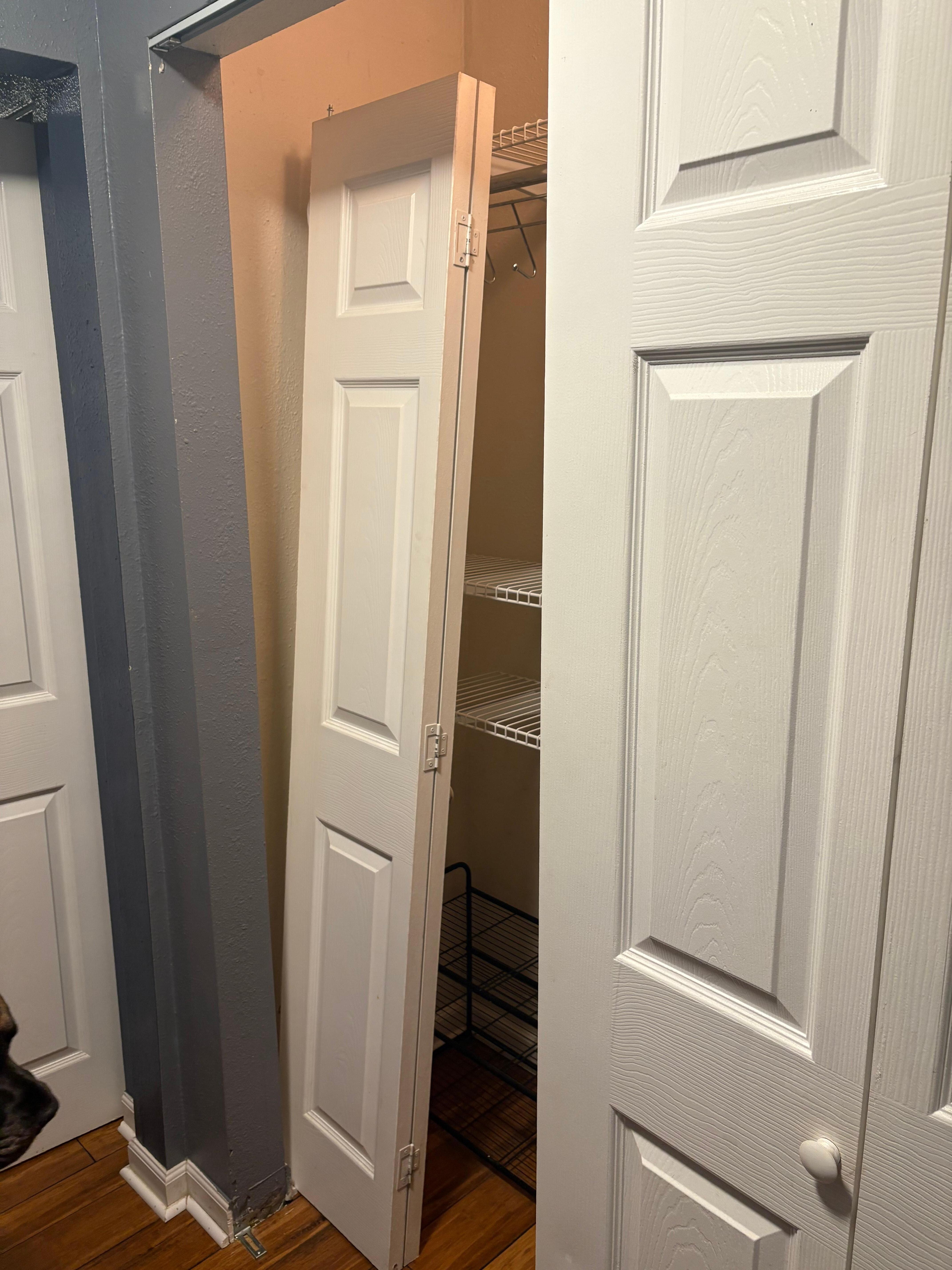 Closet door off hinges.