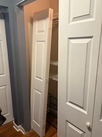 Closet door off hinges.