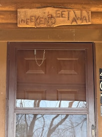 “Weekend Getaway” over front door