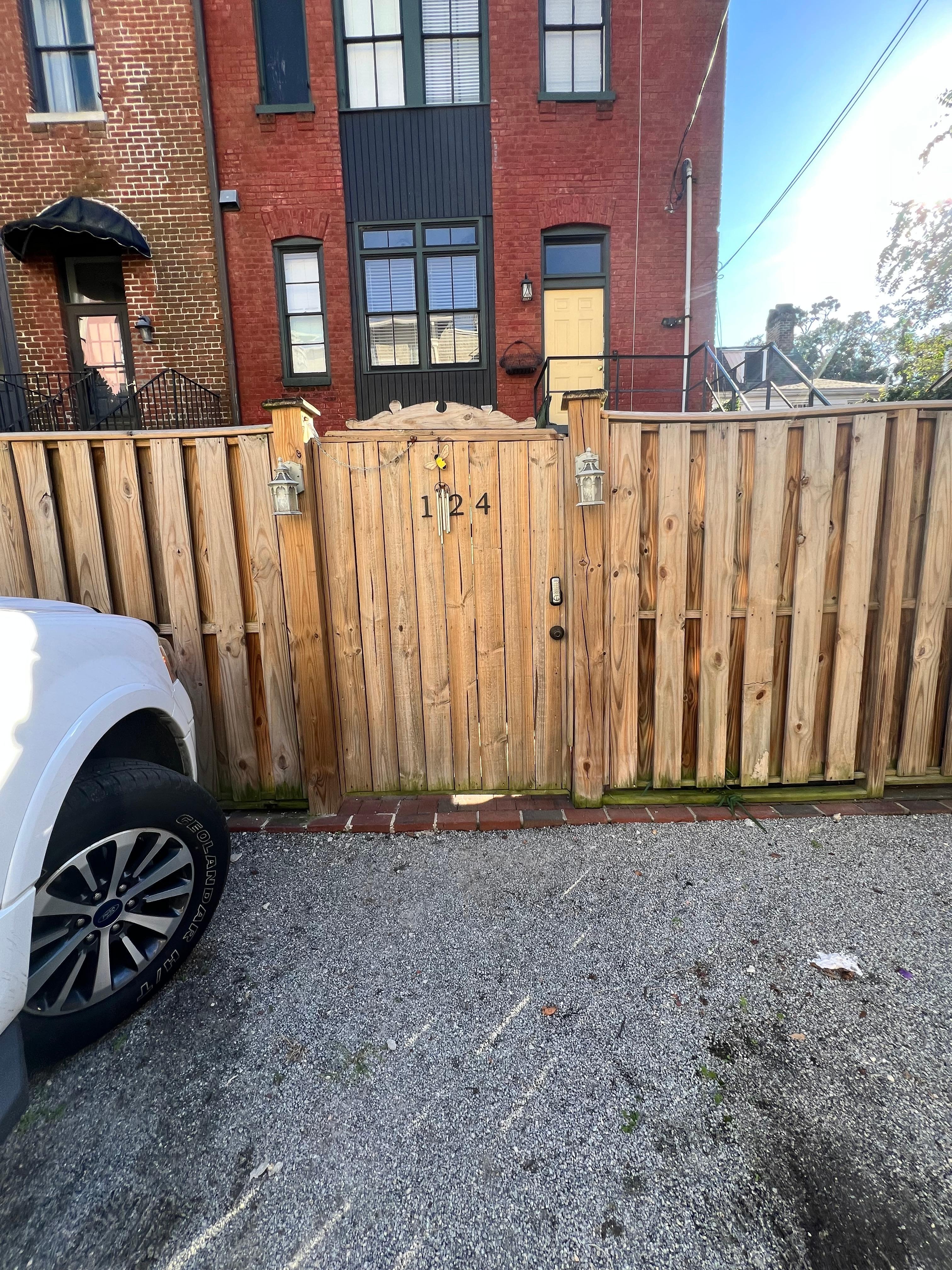 Secure gate to an adorable courtyard. 