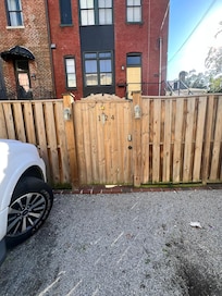 Secure gate to an adorable courtyard.