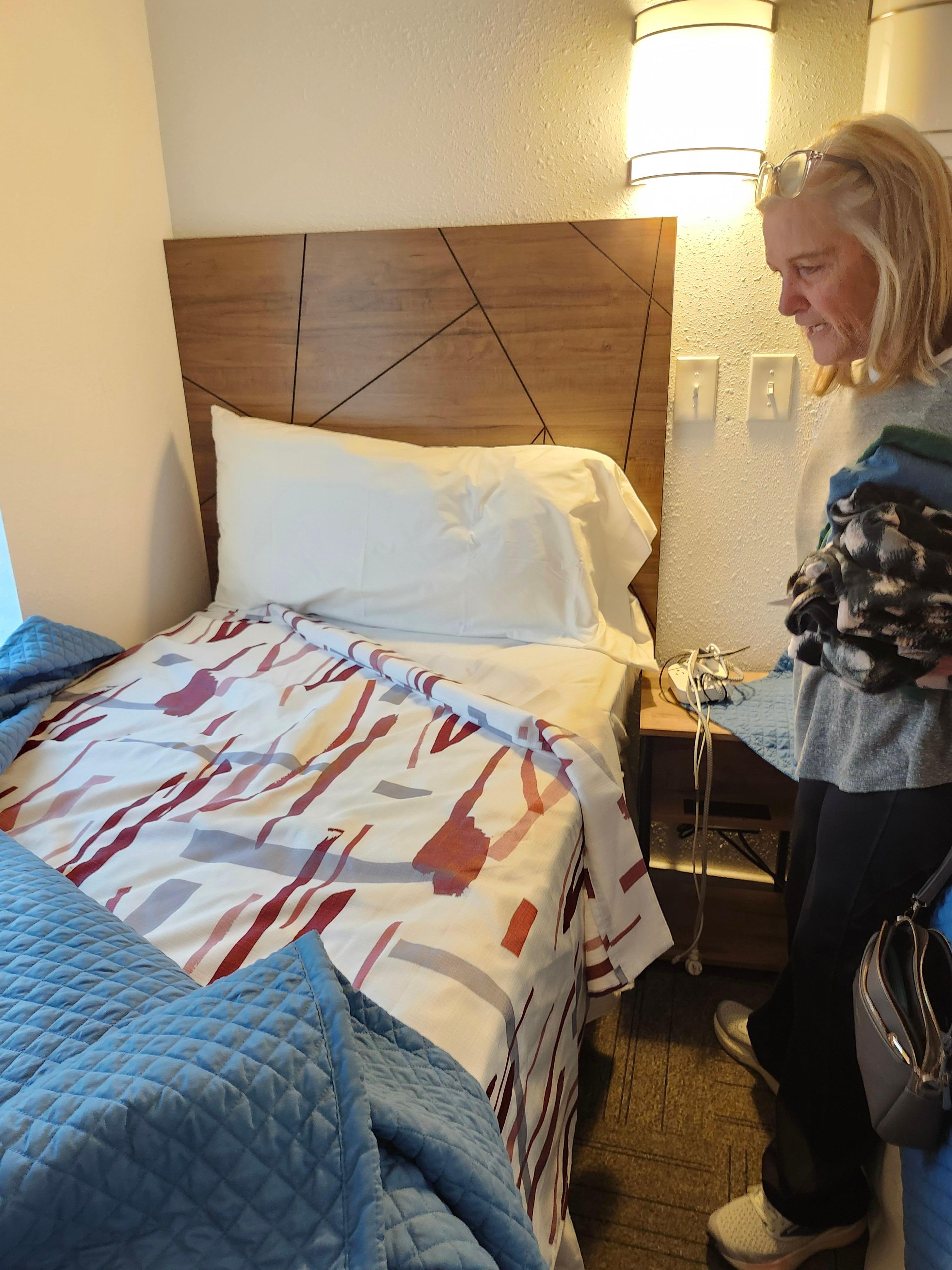 No mattress pad or cover, no sheets, no blanket.