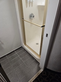 No towels or floor mat for when you get out of the shower