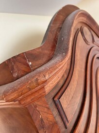 Dust on wardrobe edge.