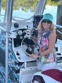 Debbie and Milo ready to go fishing for Mahi from our slip at Skipjacks aboard the Fishous with Capt Jimbo