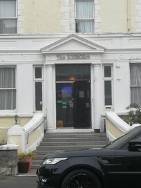 Outside the front of hotel