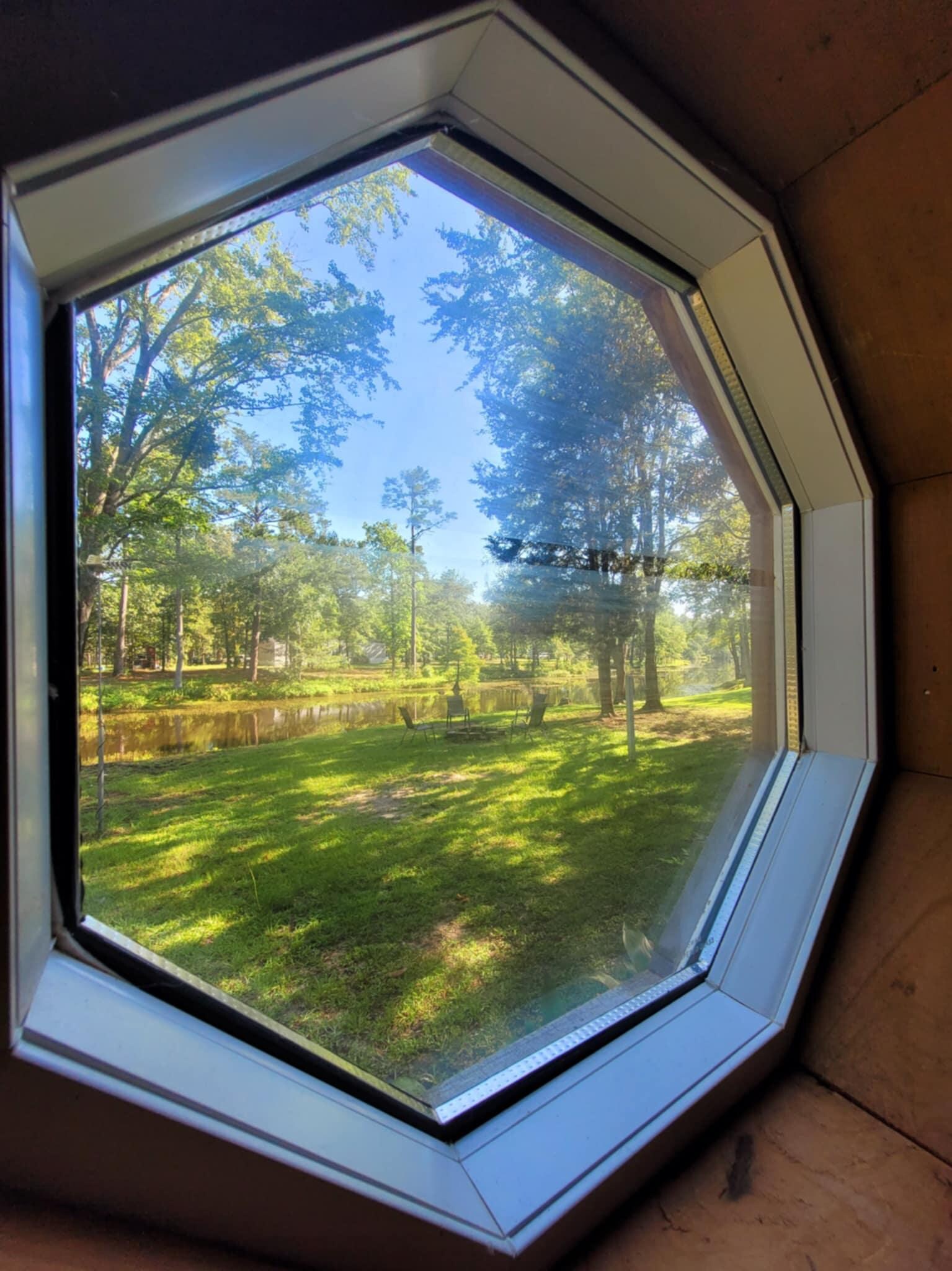 Window at the bottom of the staircase.