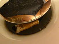 Cigarette but in the sink