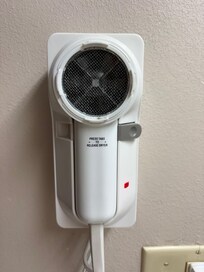 Hair dryer missing pieces although it still worked.