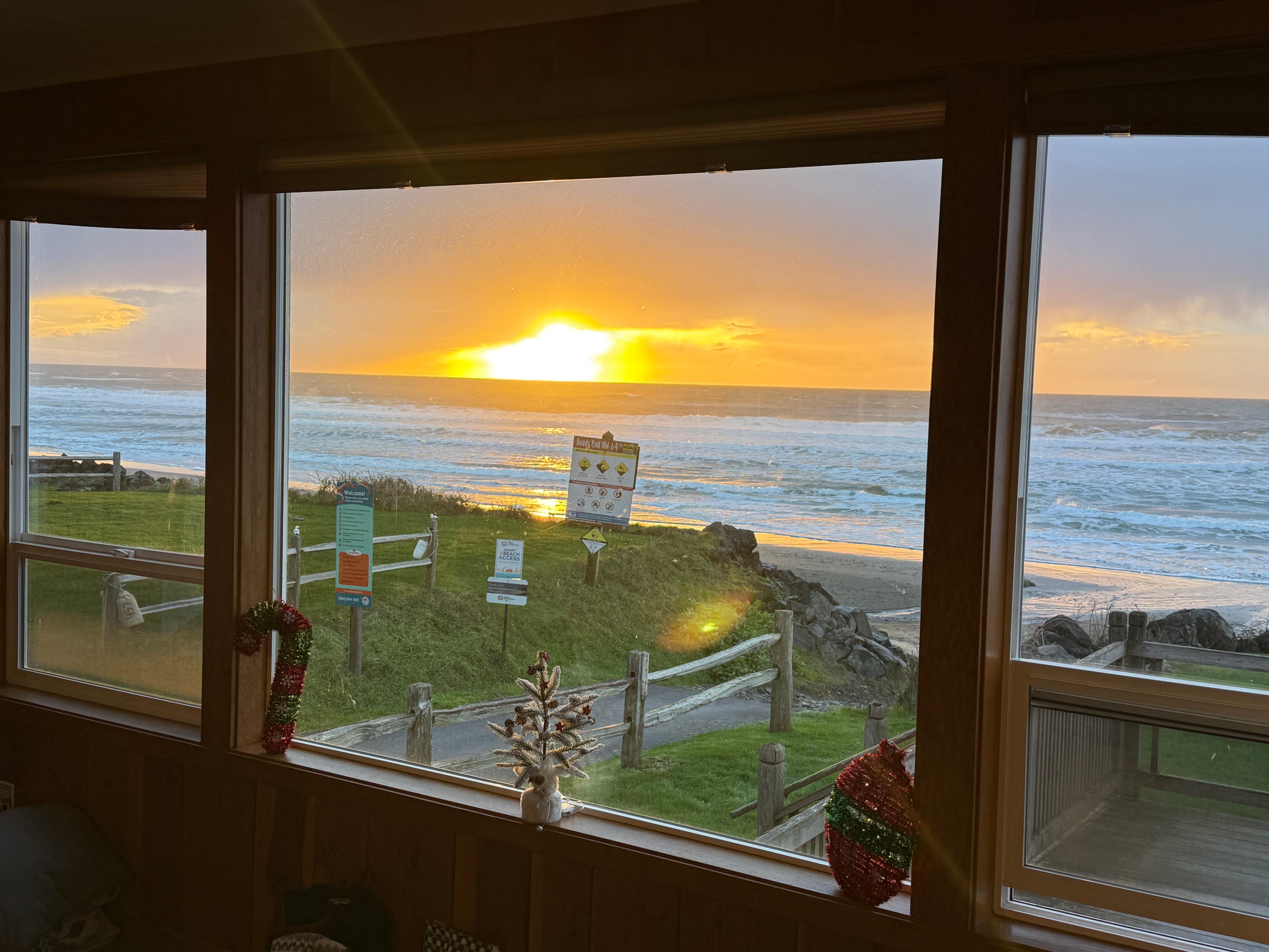 Sunset sit on the couch looking out the beautiful window windows