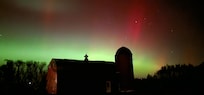 The northern light with the barn. We got lucky to see them.