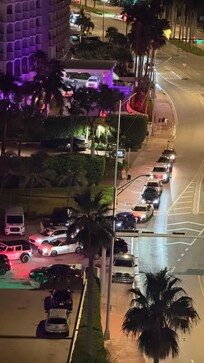a line of cars waiting to check in