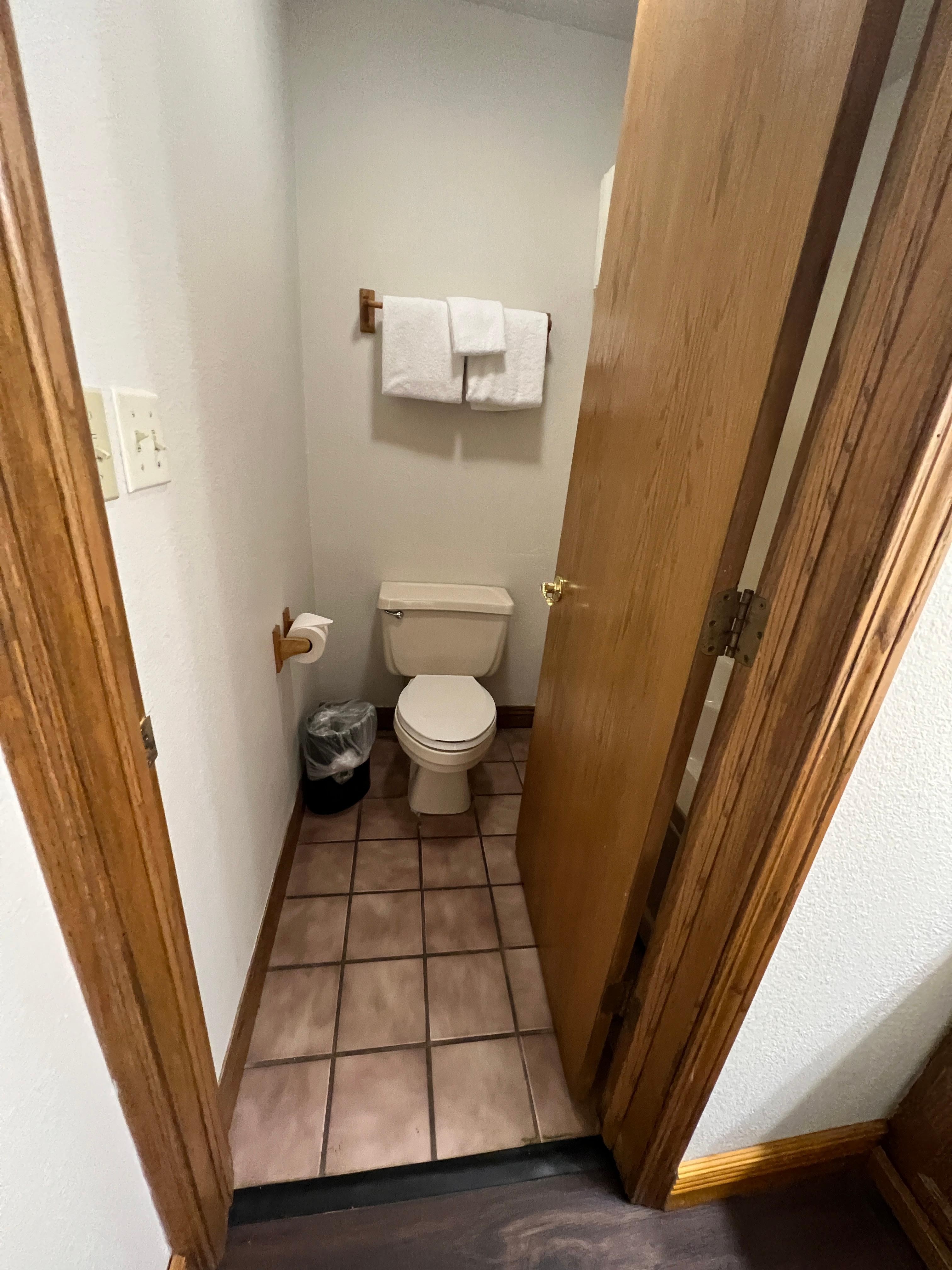 Very small an dated bathroom