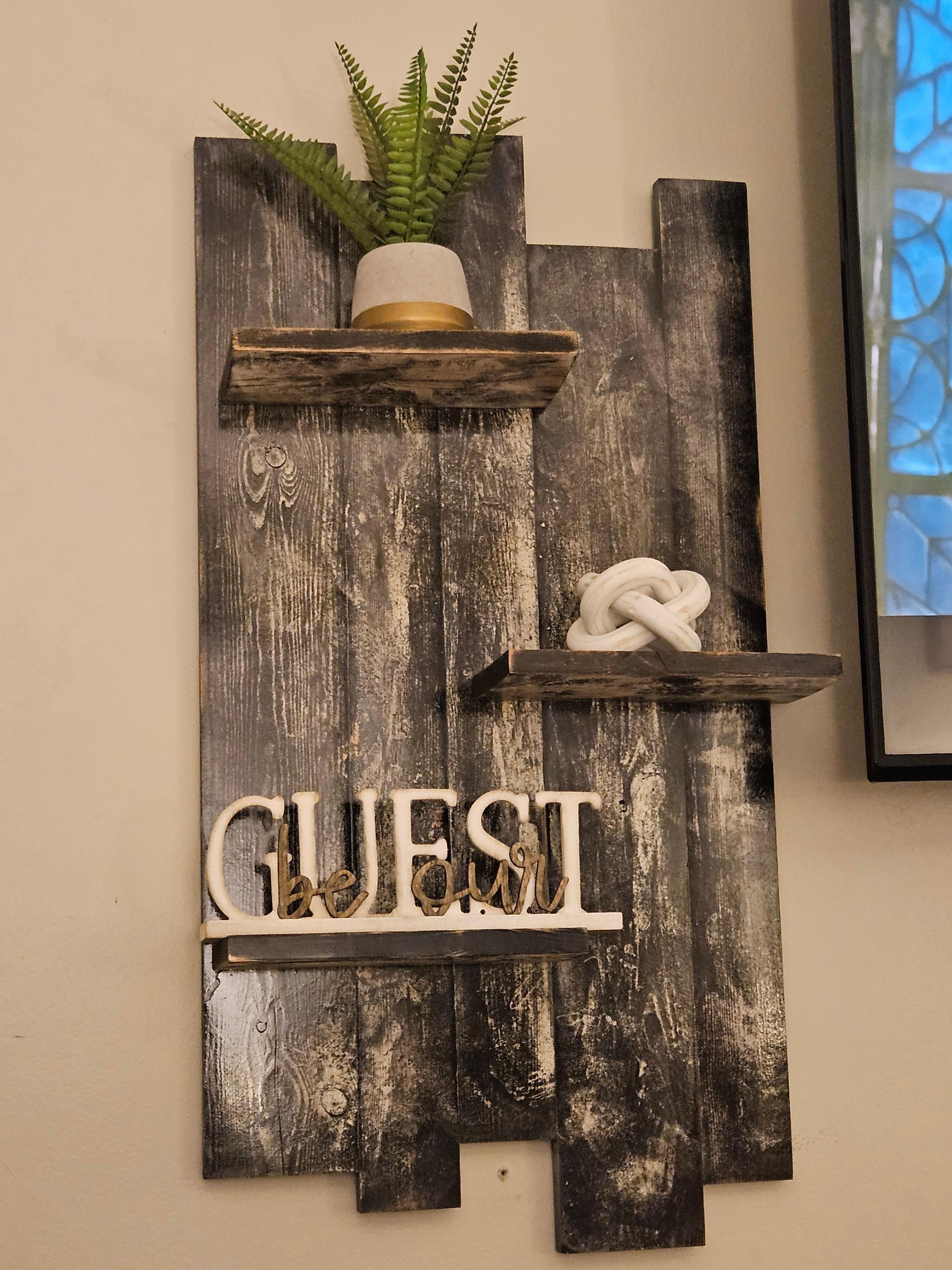 It's the light, welcoming touches for me. Makes you want to settle right in. 