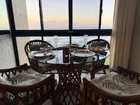 View of ocean from kitchen table - open windows for morning breeze and sound of waves!!!!