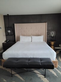 Bed in bedroom section of suite