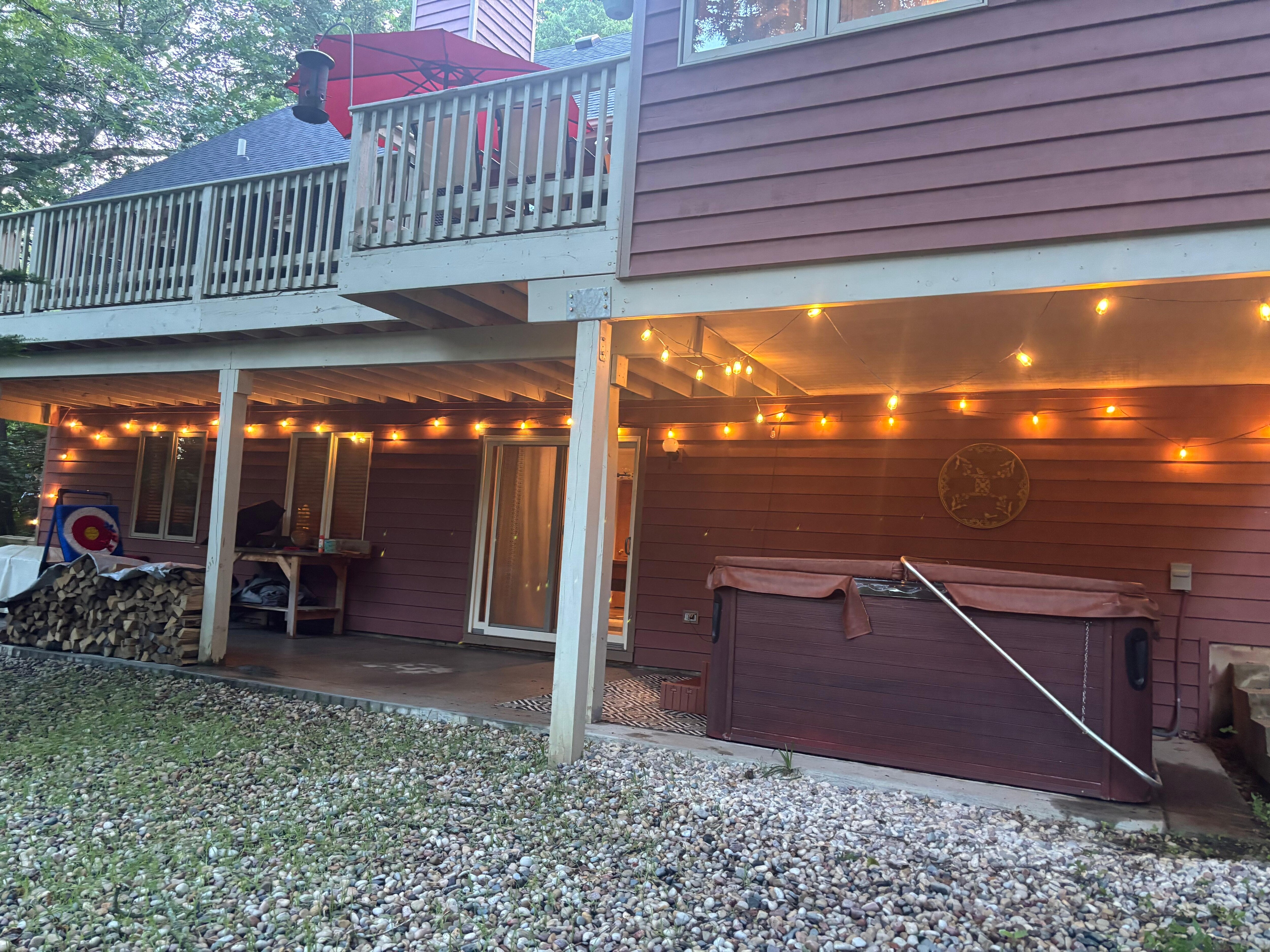 Back patio area with hot tub 