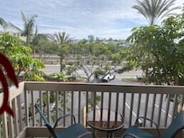 Location faces road and parking lot w constant train activity noise outside