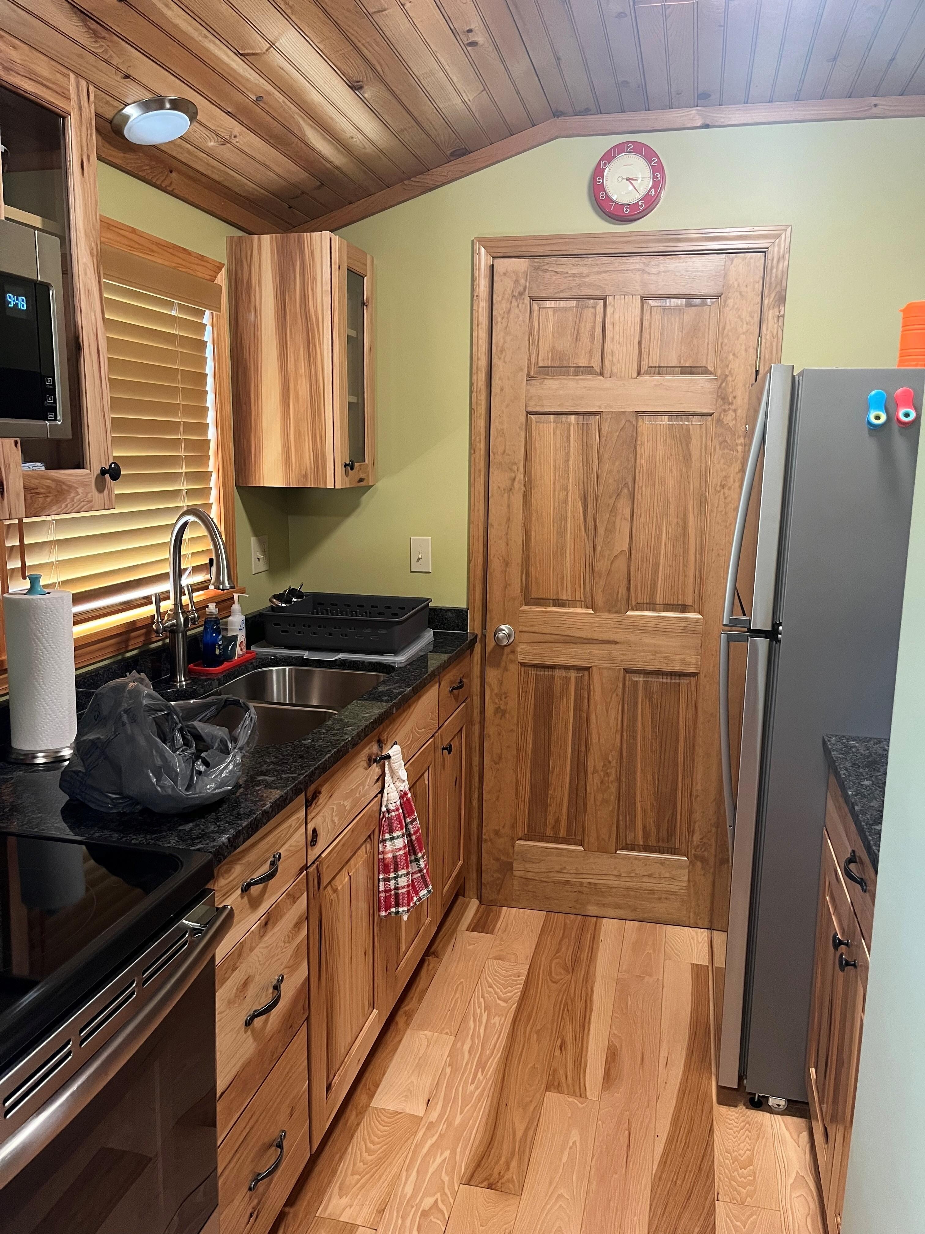 The kitchen area of the cabin