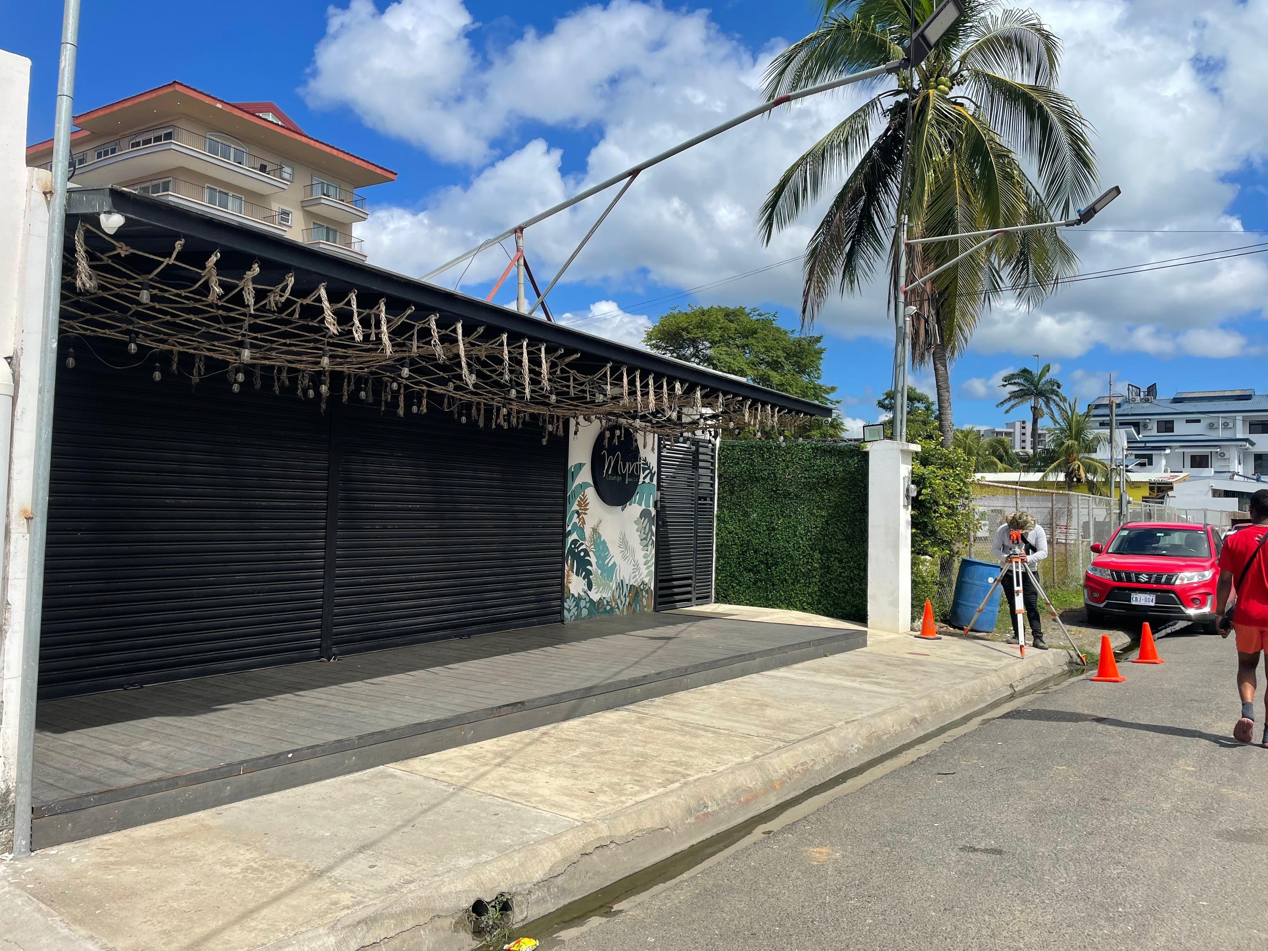 Outside of accommodations with a cool bar attached. "Mynt lounge"