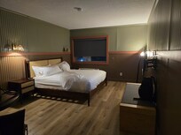 King bed room dimly lit