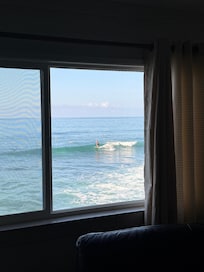 Surfers right outside the window