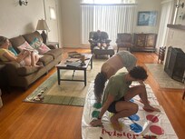Look! Adult children playing twister! Thanks for leaving all the games for us!