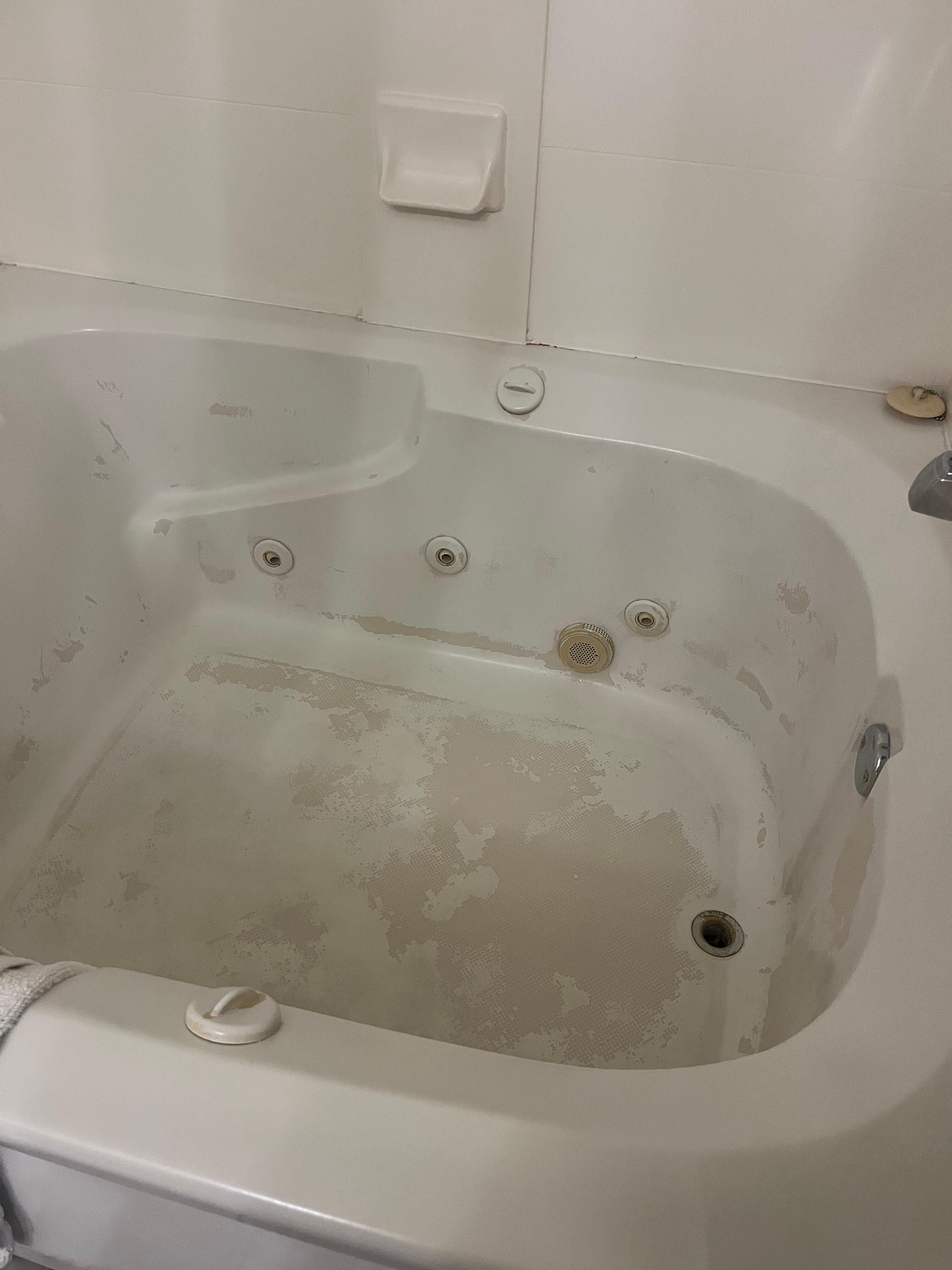Bathtub finish coming off therefore looked dirty