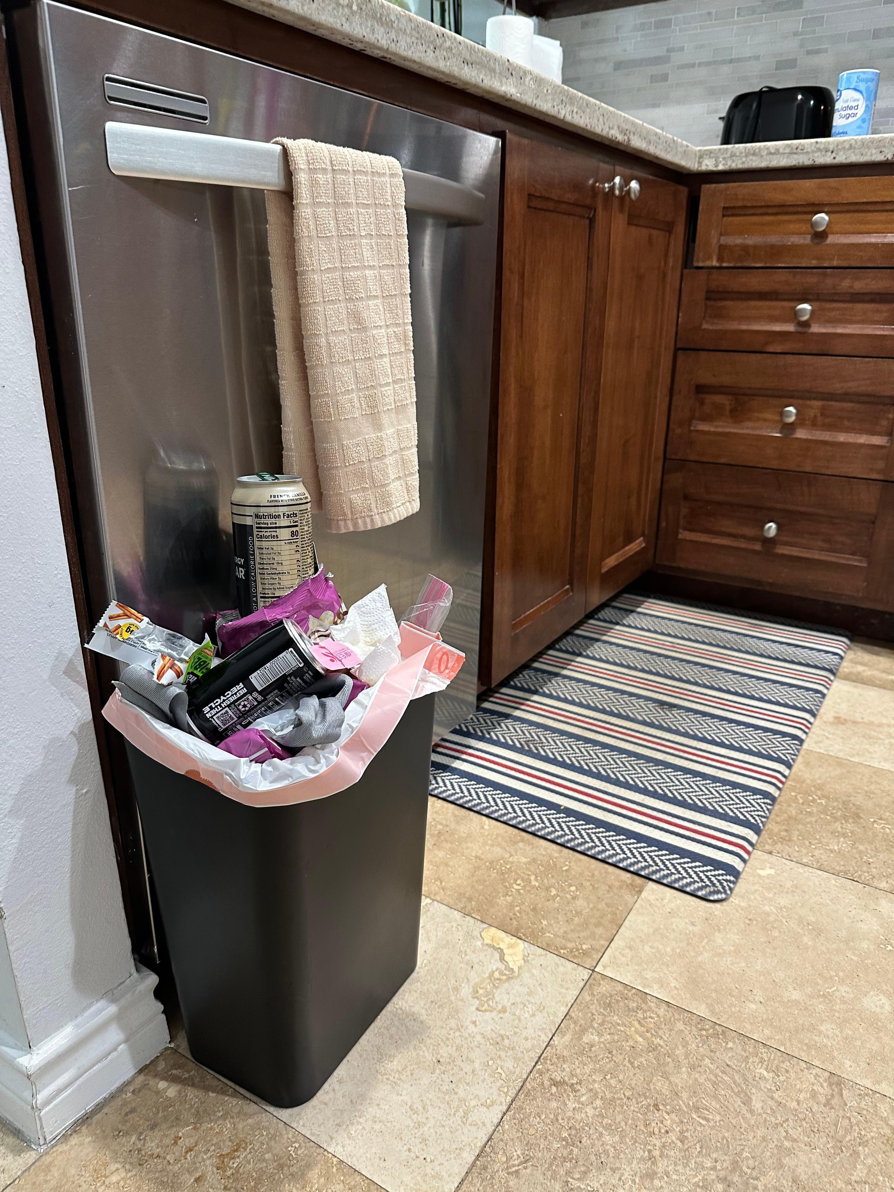 tiny kitchen trashcan - like a bathroom trash can..