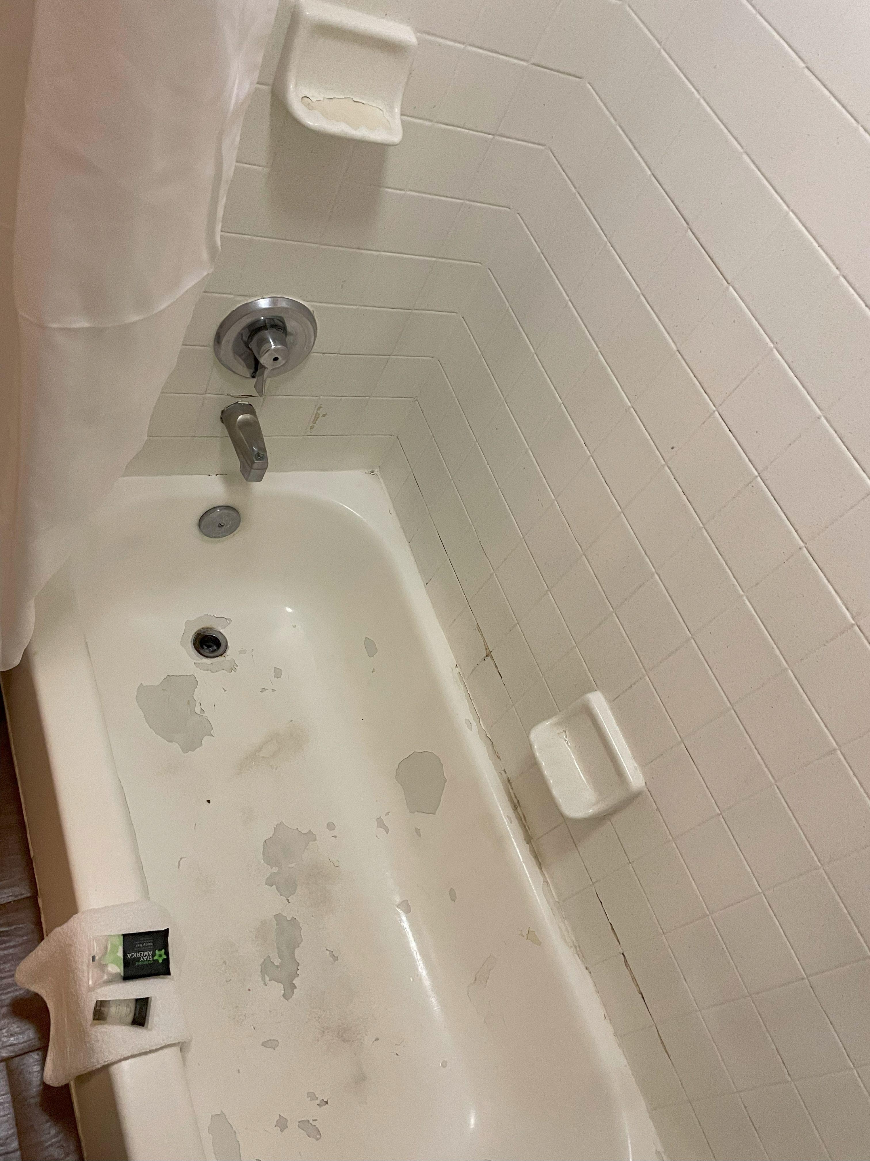 This is the 2nd room AFTER I told them the 1st room was dirty and not cleaned. Notice the broken soap tray.